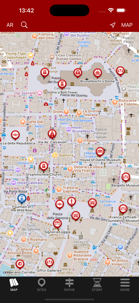 Florence Tour - Travel Guide - Un mapa detallado de calles de Florencia en la aplicación Florence Tour que muestra marcadores de sitios históricos y herramientas de navegación.