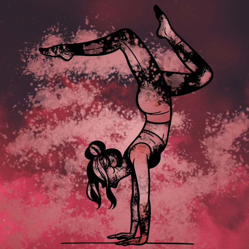 a woman doing a handstand