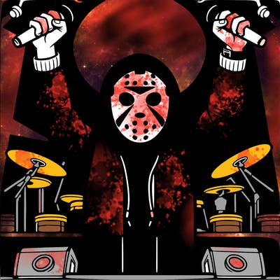 man with hockey mask and hoodie, raising his fist, on a stage