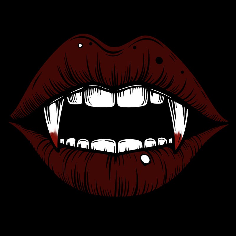 lips with vampire teeth