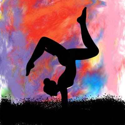 a woman doing a handstand