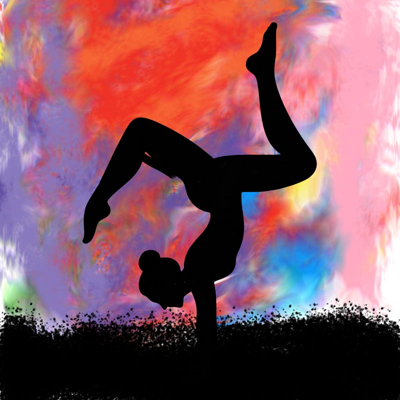 a woman doing a handstand