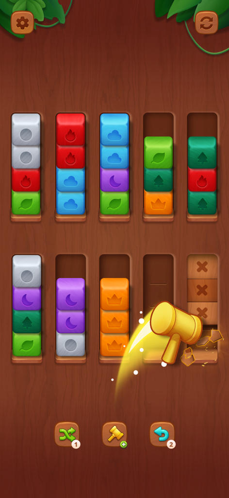 Wooden of Wonders: Blocksort - Wooden sorting puzzle game interface showing colorful blocks and a golden hammer booster breaking blocks