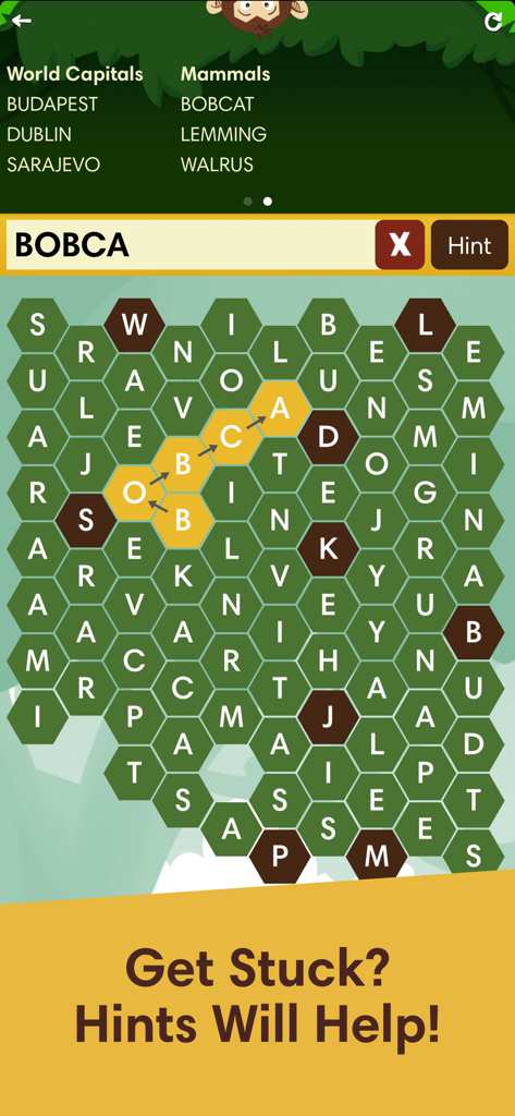 Puzzle de caça-palavras Monkey Wrench apresentando uma grade hexagonal e funcionalidade de dicas.