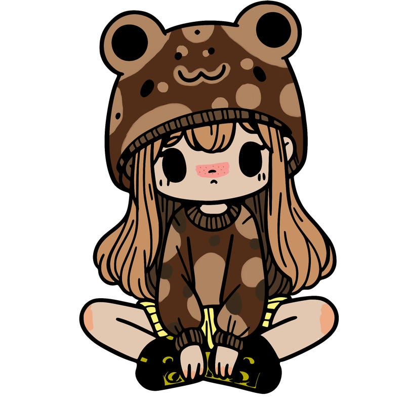 a girl wearing a frog hat and some frog socks