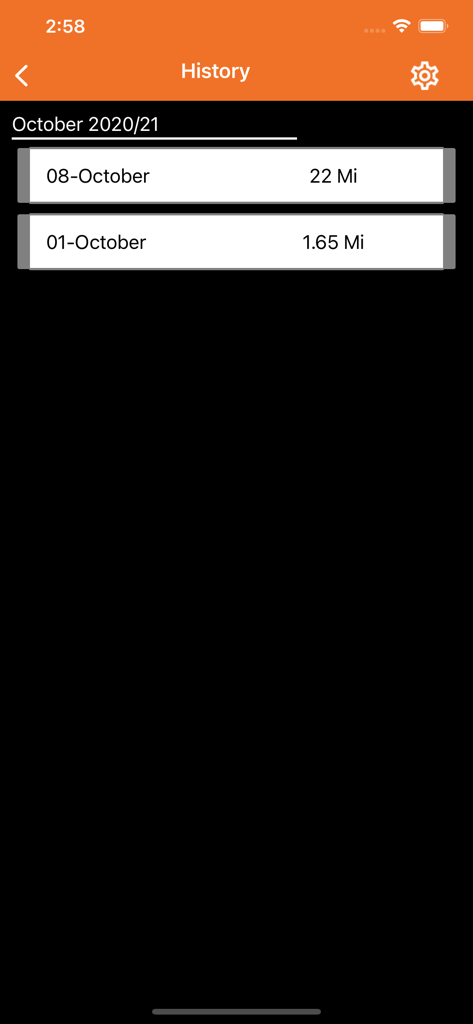 Mileage Trackアプリの履歴画面。10月の走行距離を含む記録された出張のリストが表示されています。