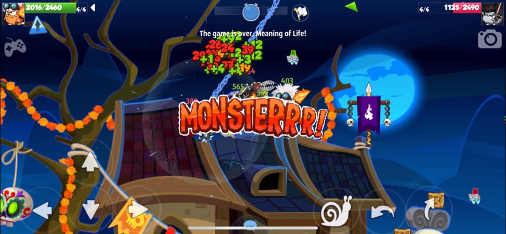 A tactical PvP battle scene in Wormix with a Monster victory message on a spooky night map