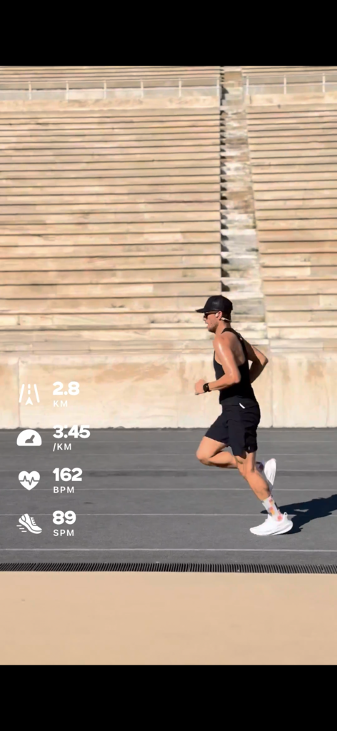 A runner on a track with a digital overlay showing distance pace heart rate and steps per minute