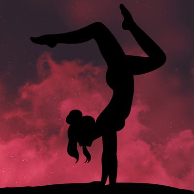 a woman doing a handstand