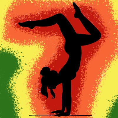 a woman doing a handstand
