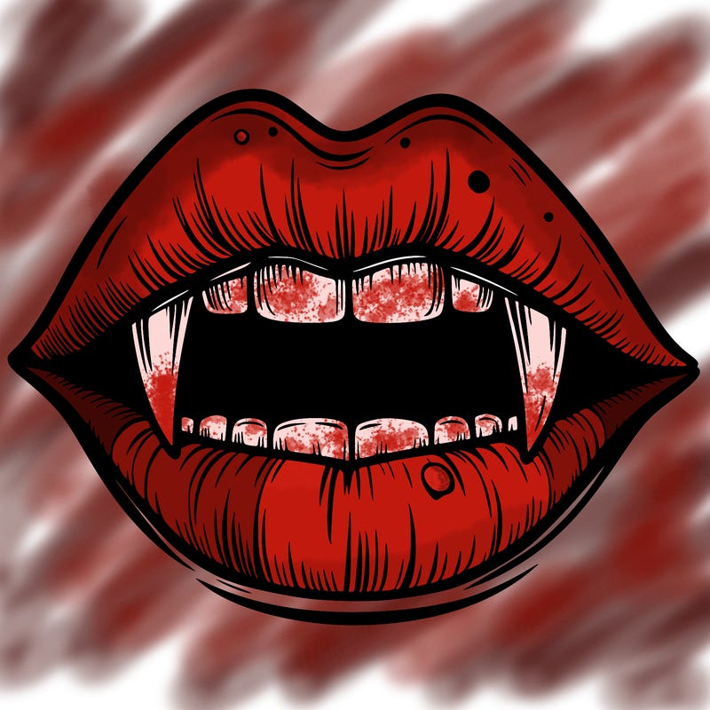 lips with vampire teeth