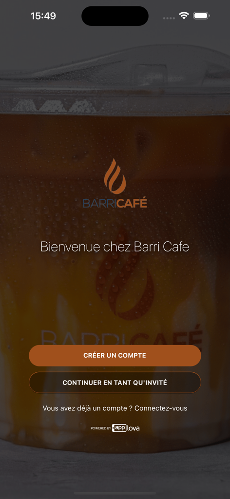 Barri Cafe - Barri Cafe mobile app welcome screen featuring a cold coffee background with login and guest options