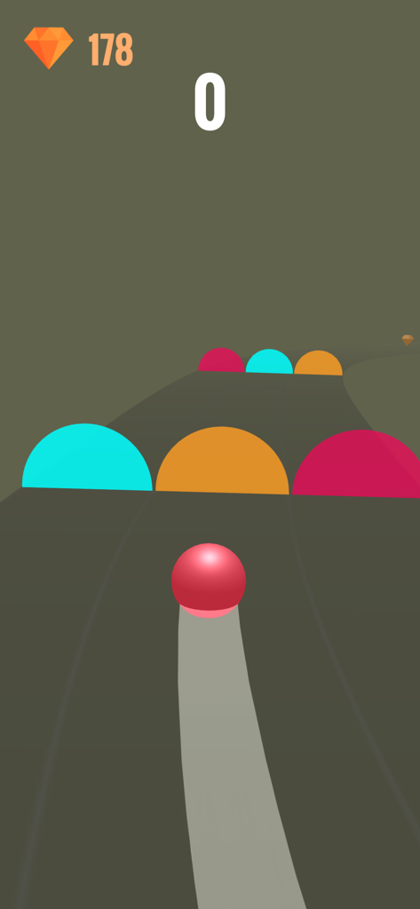 Color Ball Rush! - Bola rosa rolando em direção a obstáculos coloridos no jogo arcade Color Ball Rush