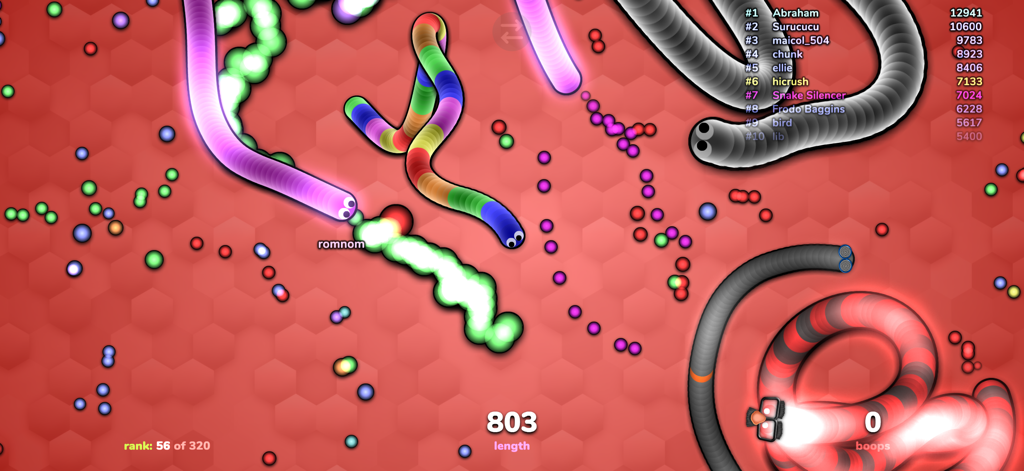 slither.io - Multiplayer-Gameplay von slither io mit bunten Schlangen und leuchtenden Nahrungspartikeln auf rotem Hintergrund.