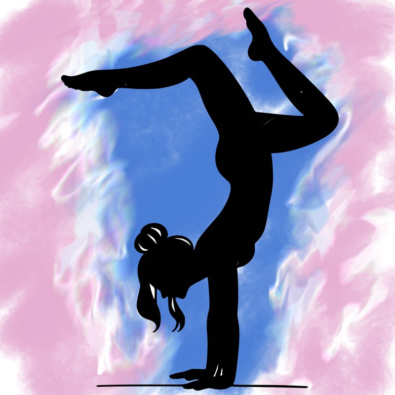 a woman doing a handstand