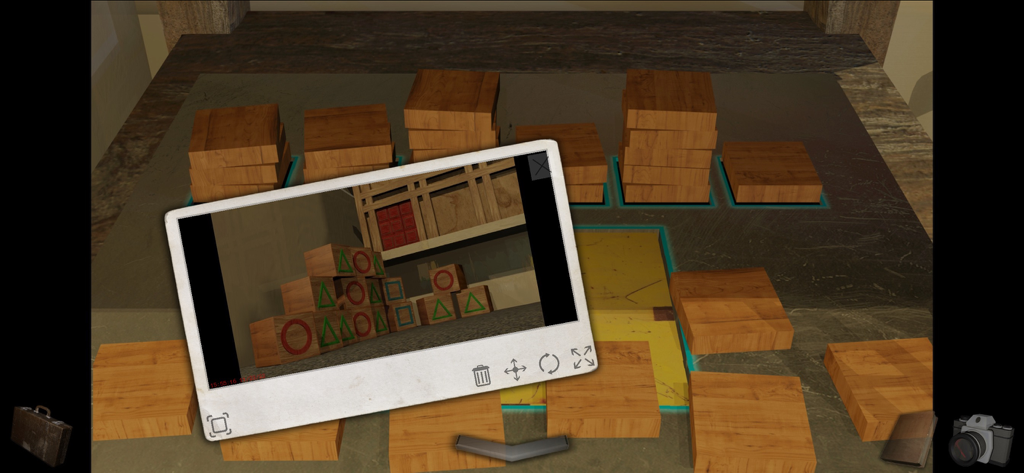 A Short Tale - A first-person view of a wooden block puzzle in A Short Tale showing the Glitch Camera clue tracking system.
