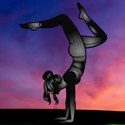 a woman doing a handstand