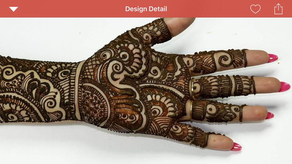 Intricate bridal mehndi henna design on a palm
