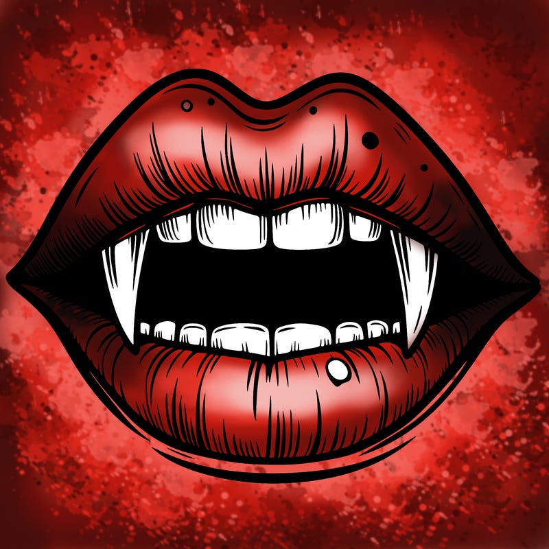 lips with vampire teeth