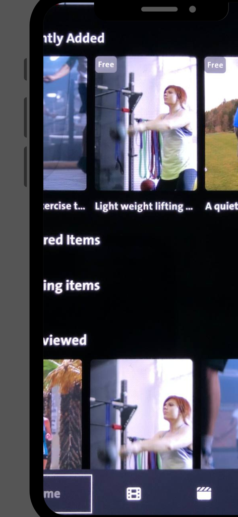 Luna TV - Luna TV app interface showing a gallery of short sports and fitness videos with a woman lifting weights