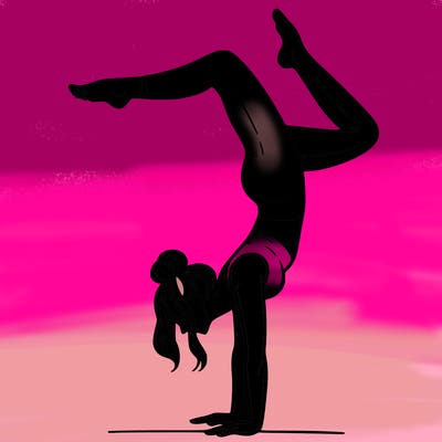a woman doing a handstand