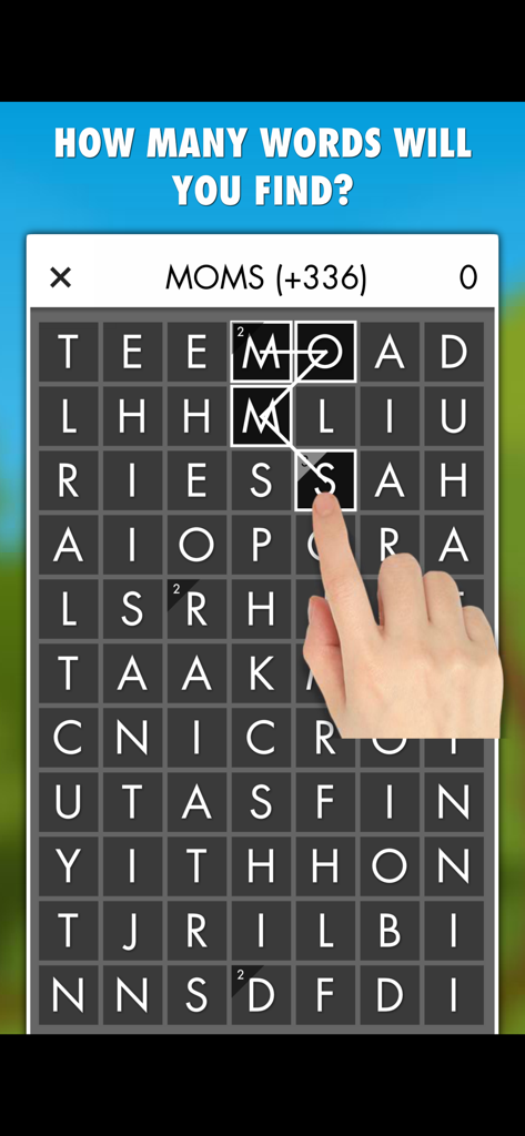 Word Search Champion PRO - Gameplay screen of Word Search Champion PRO showing a hand selecting the word MOMS on a letter grid