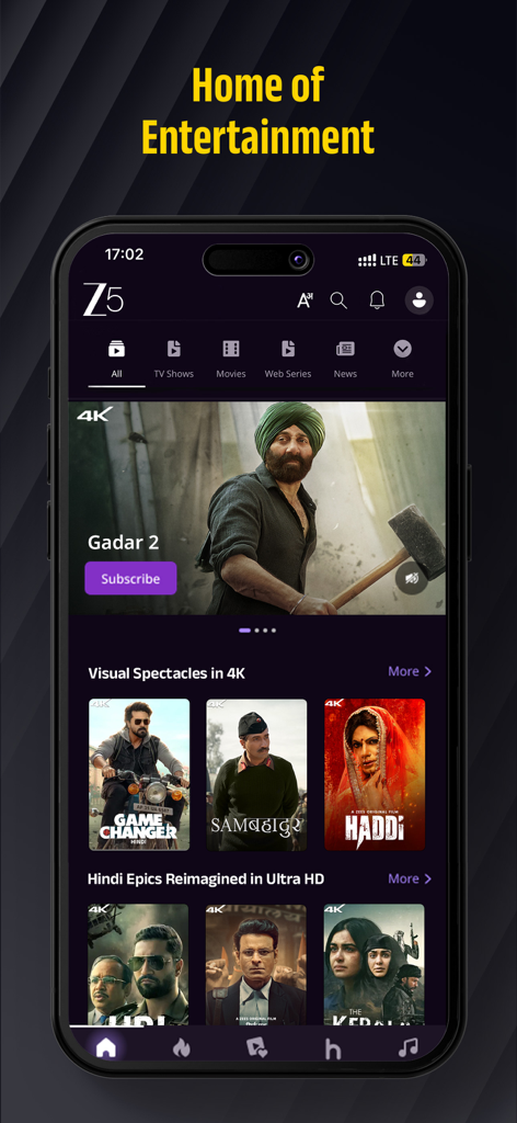 Pantalla de inicio de la aplicación móvil ZEE5 que muestra películas indias populares como Gadar 2 y varias categorías de entretenimiento en 4K.