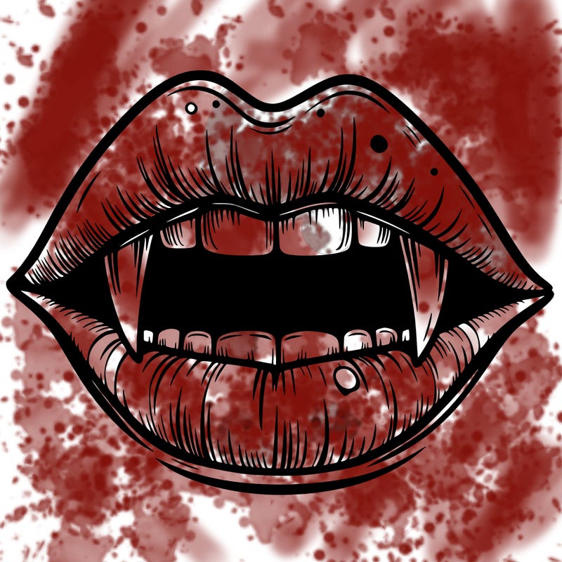 lips with vampire teeth
