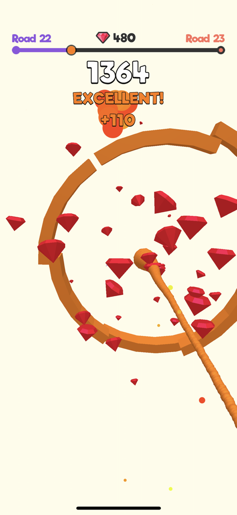 Gameplay of Slime Road showing a slime ball jumping through an orange ring and collecting red gems.