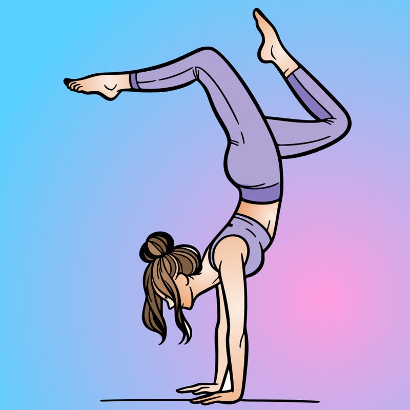 a woman doing a handstand