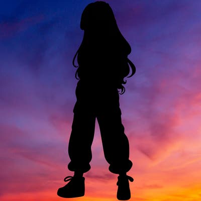 girl in baggy pants crop top and long hair