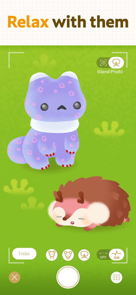 Livly Island - Adopt Cute Pets - Two cute alchemical pets relaxing on a green field in the Livly Island mobile app