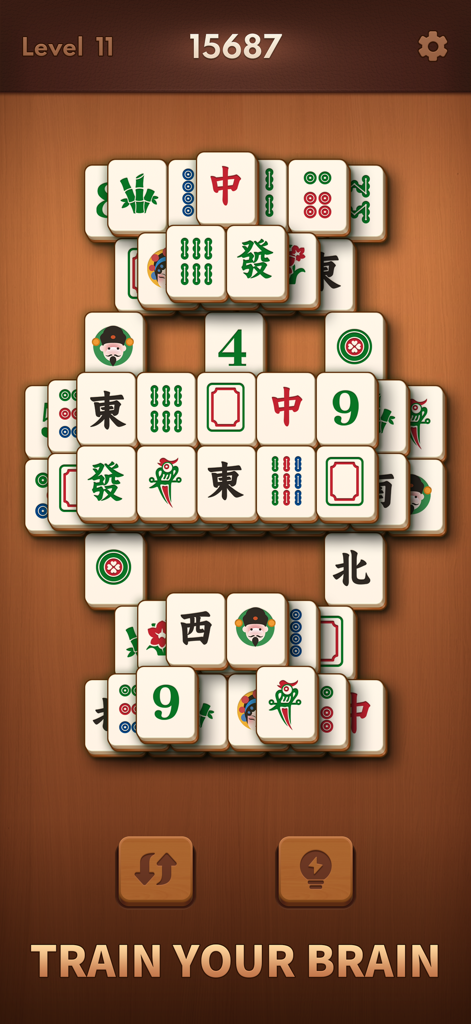 Mahjong Blast gameplay screen with large tiles and Train Your Brain text