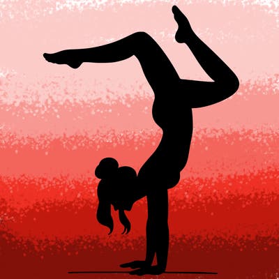 a woman doing a handstand