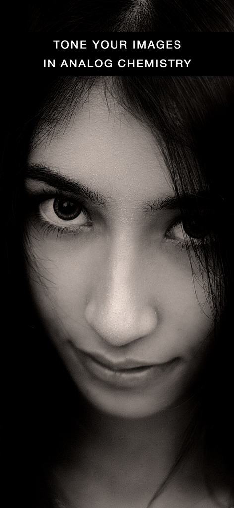 Close-up black and white portrait showcasing analog chemistry toning in the Darkr app