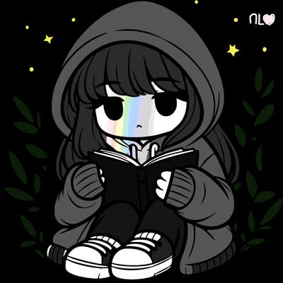 girl in oversized hoodie reading a book