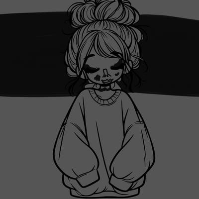 girl with baggy sweatshirt and messy bun