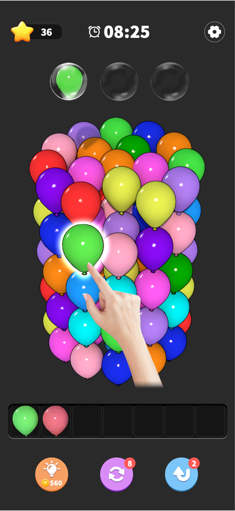 Balloon Triple Match: Match 3D - A hand selecting a green balloon from a colorful pile in the 3D matching puzzle game.