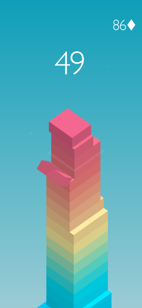 Gameplay of Stack by Ketchapp showing a tall tower of colorful gradient blocks and a score of 49