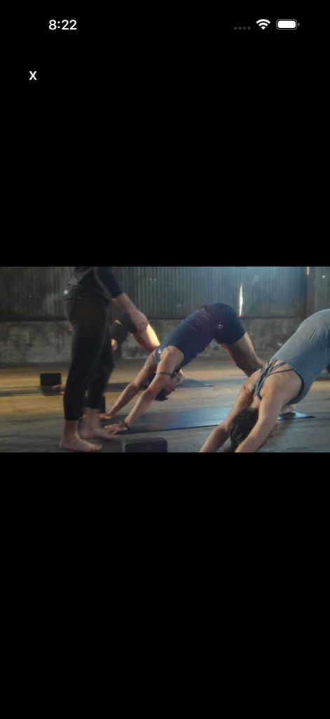 Inner Dimension - A cinematic yoga class with students practicing the downward dog pose