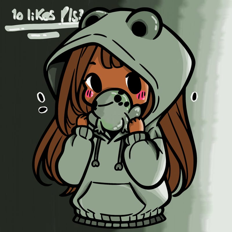 a girl holding a froggy hoodie