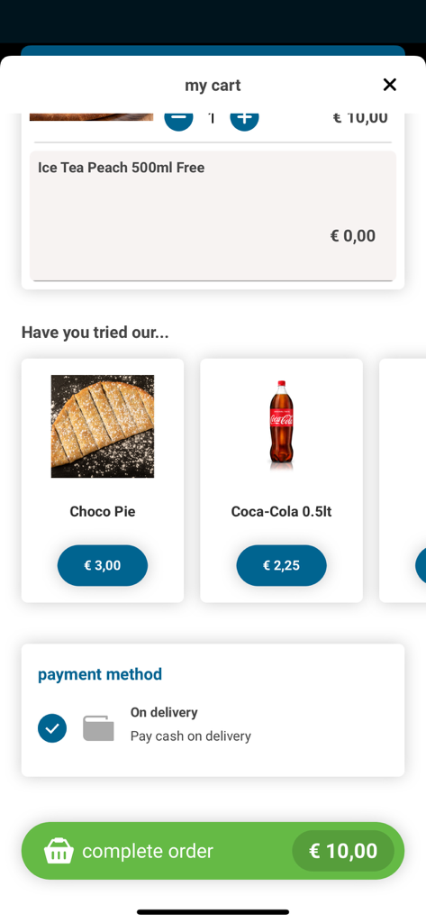 Checkout screen of Domino's Malta app showing items in the cart, suggested products like choco pie, and cash on delivery payment option.