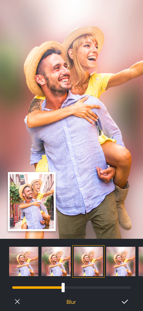 Una interfaz de aplicación de edición de fotos que muestra a una pareja con un efecto de fondo profesionalmente desenfocado