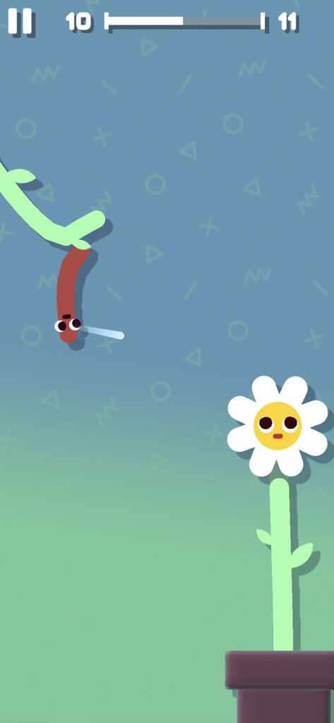 Sausage Flip - ソーセージフリップのゲームプレイで、植木鉢の中のデイジーに向かってジャンプする漫画のソーセージ