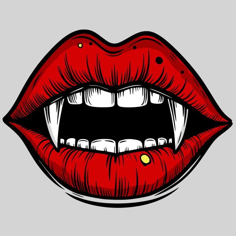 lips with vampire teeth