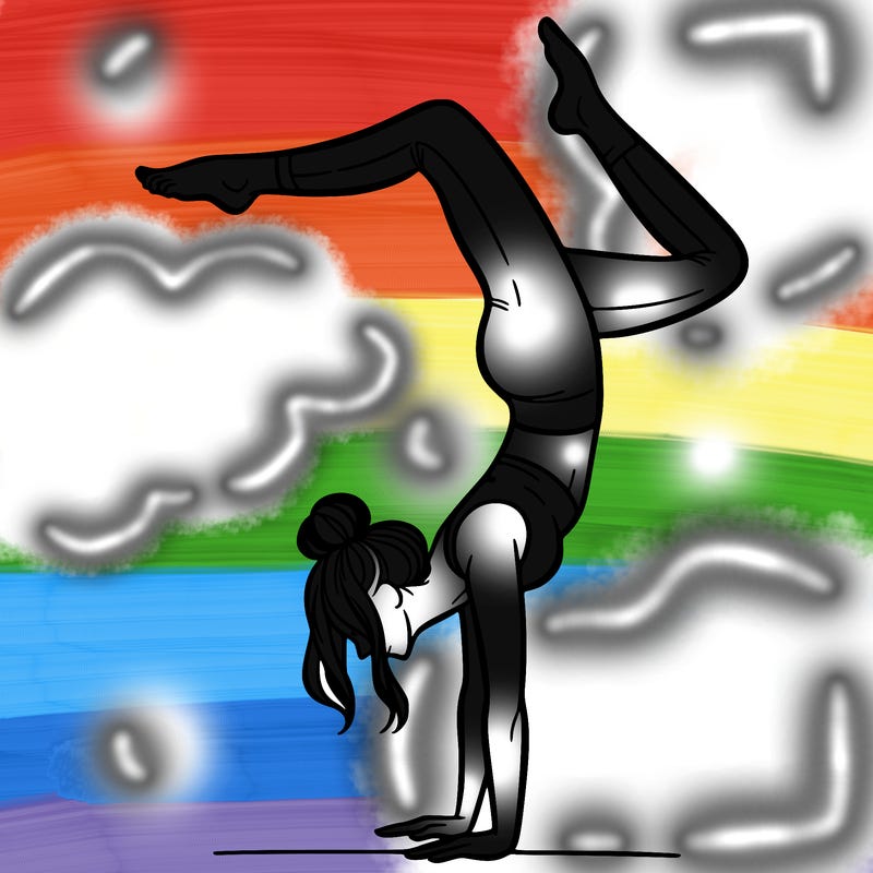 a woman doing a handstand