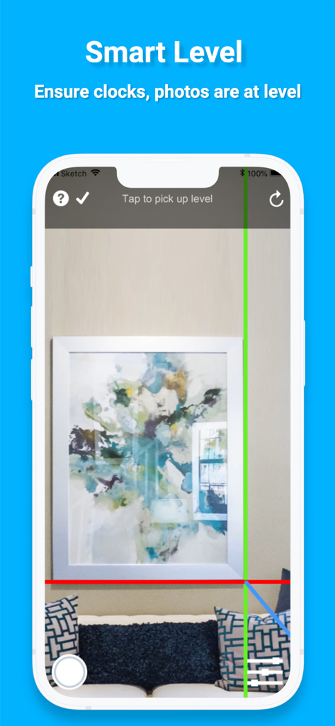 iPhone screen showing the smart level feature of the measuring tape app being used to level a framed painting on a wall