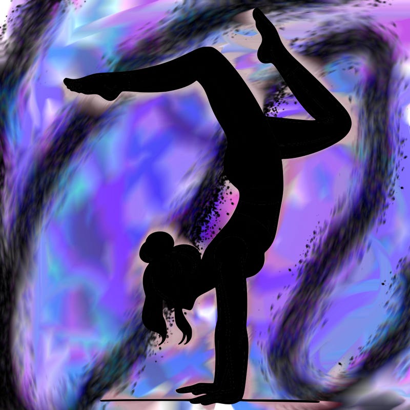 a woman doing a handstand