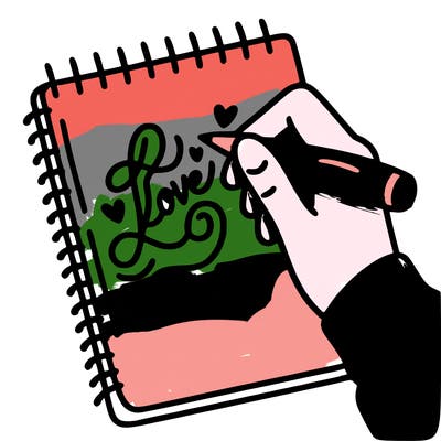 a hand writing “love” in calligraphy on a notebook