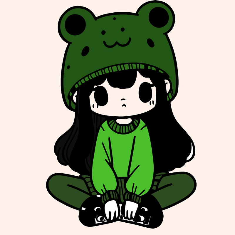 a girl wearing a frog hat and some frog socks